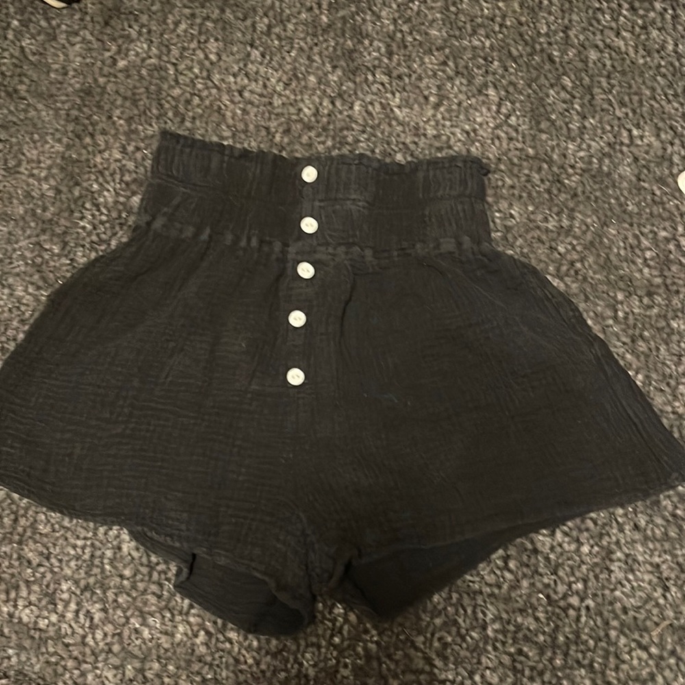 Black shorts with faux buttons